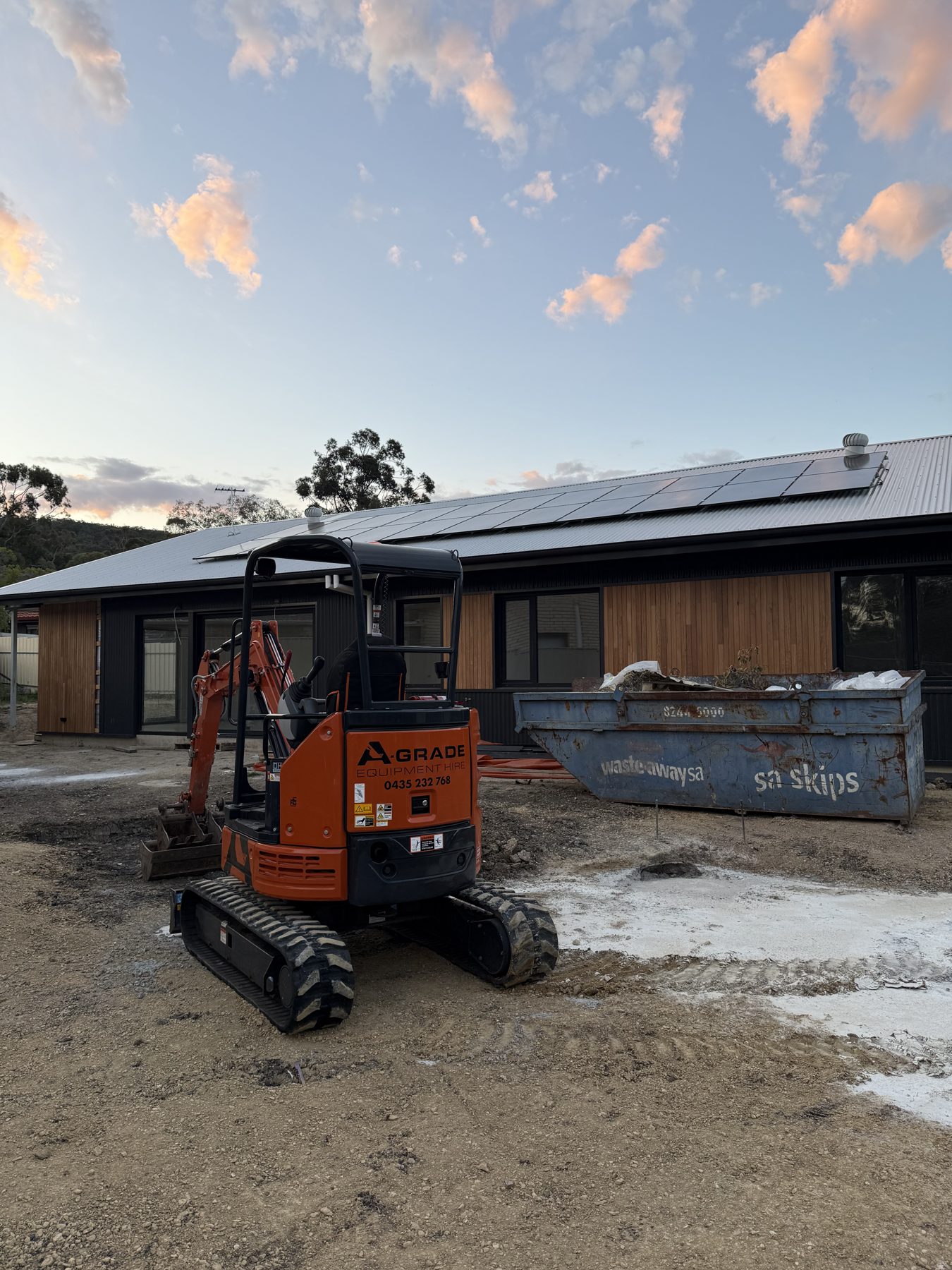 Mini excavator on a new build site